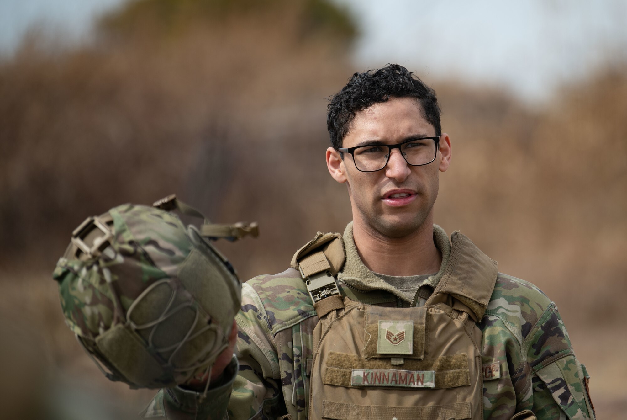 Airmen assigned to the 8th Security Forces Squadron collect and debrief after participating in simulated ground attack training at Kunsan Air Base, Republic of Korea, March 10, 2022.