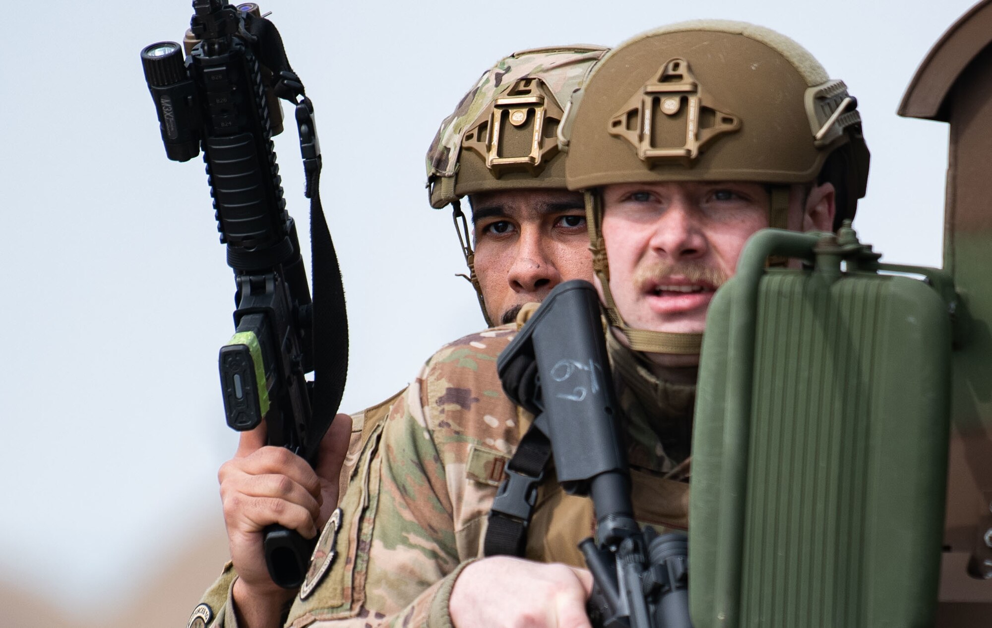 Airmen assigned to the 8th Security Forces Squadron collect and debrief after participating in simulated ground attack training at Kunsan Air Base, Republic of Korea, March 10, 2022.