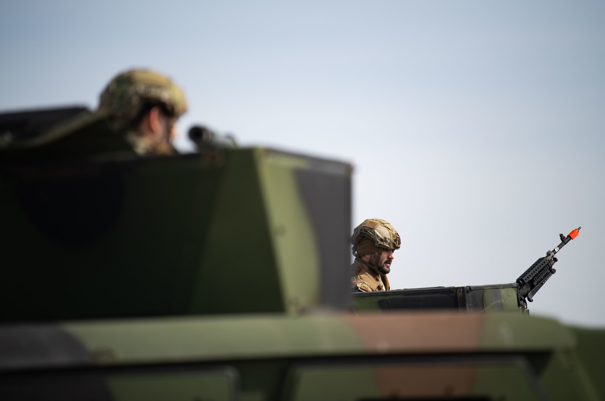 Airmen assigned to the 8th Security Forces Squadron collect and debrief after participating in simulated ground attack training at Kunsan Air Base, Republic of Korea, March 10, 2022.