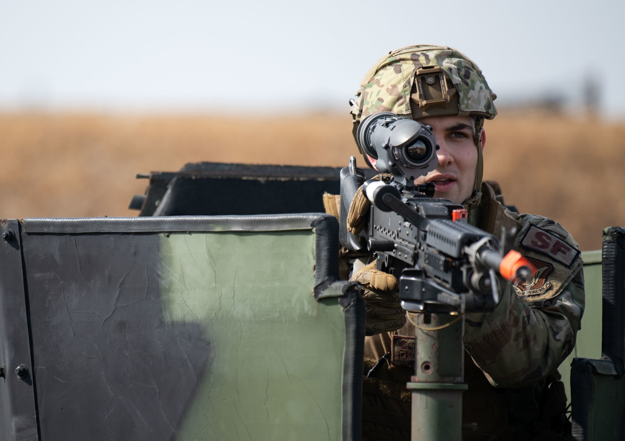 Airmen assigned to the 8th Security Forces Squadron collect and debrief after participating in simulated ground attack training at Kunsan Air Base, Republic of Korea, March 10, 2022.