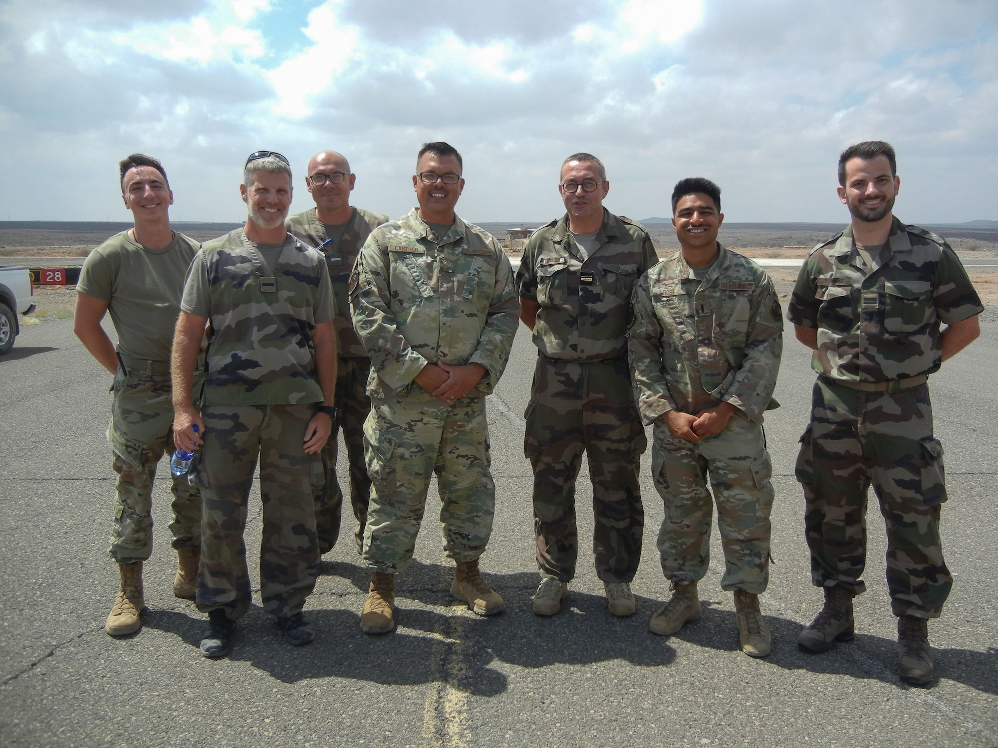 Airmen from the 776th Expeditionary Air Base Squadron airfield operations flight hosted members from the French military to discuss runway repairs at Chabelley Airfield (CADJ), Djibouti, March 10, 2022. As a part of a trilateral agreement, CADJ is a French installation operated by the United States in the country of Djibouti demonstrating the various partnerships and alliances the U.S. relies on to strengthen defense institutions and counter a multitude of threats to ensure a more stable, prosperous Africa. (U.S. Air Force courtesy photo by Tech. Sgt. Joel Yerkey)