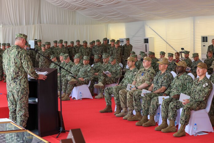 Rear Adm. Keith Smith, deputy commander of U.S. Coast Guard Atlantic Area, delivers remarks during the decommissioning ceremony for USCGC Maui (WPB 1304), USCGC Monomoy (WPB 1326) and USCGC Wrangell (WPB 1332) at Naval Support Activity Bahrain, March 22