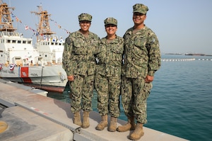 Left to right, Lt. Brianna Townsend, commanding officer of USCGC Wrangell (WPB 1332), Lt. Terry Netusil, commanding officer of USCGC Monomoy (WPB 1326) and Lt. Freddy Hofschneider, commanding officer of USCGC Maui (WPB 1304), pose for a photo following the decommissioning ceremony for Maui, Monomoy and Wrangell at Naval Support Activity Bahrain, March 22.