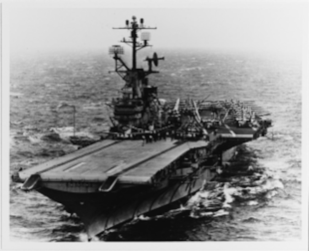 USS INTREPID (CVS-11) preparing to launch aircraft, circa 1962.