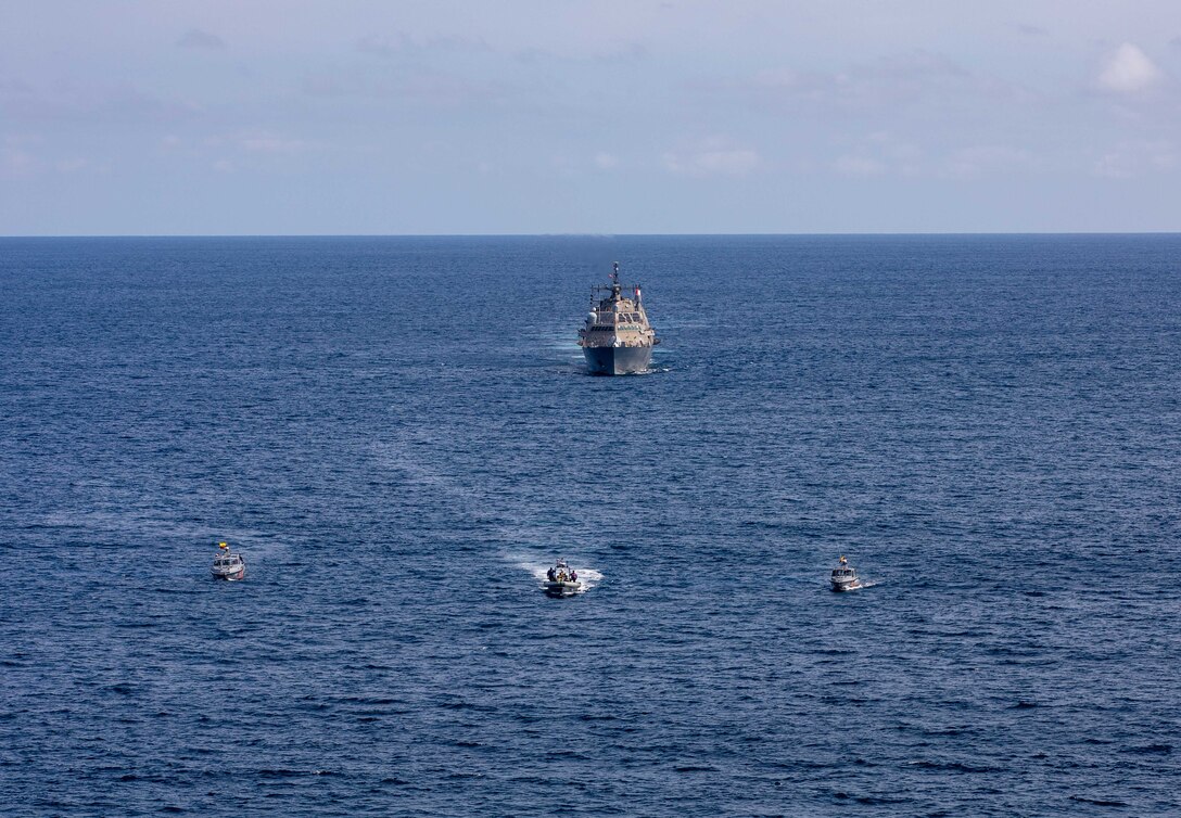 The Freedom-variant littoral combat ship USS Milwaukee (LCS 5), her 11-meter rigid-hull inflatable boat (RHIB), and Ecuadorian Coast Guard vessels LAE Rio Jubones (LG-120) and LAE Rio Tangare (LG-128), conduct a bilateral maritime interdiction exercise off the coast of Manta, Ecuador, March 21, 2022. Milwaukee is deployed to the U.S. 4th Fleet area of operations to support Joint Interagency Task Force South’s mission, which includes counter-illicit drug trafficking missions in the Caribbean and Eastern Pacific.