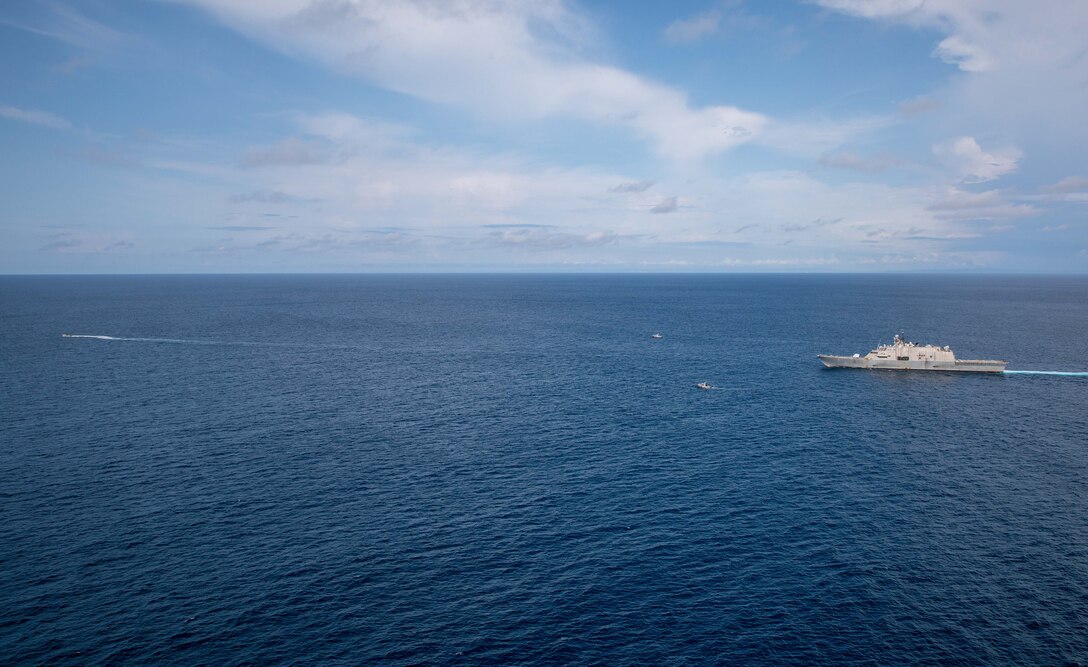 EASTERN PACIFIC OCEAN - (March 21, 2022) -- The Freedom-variant littoral combat ship USS Milwaukee (LCS 5), her 11-meter rigid-hull inflatable boat (RHIB), and Ecuadorian Coast Guard vessels LAE Rio Jubones (LG-120) and LAE Rio Tangare (LG-128), conduct a bilateral maritime interdiction exercise off the coast of Manta, Ecuador, March 21, 2022. Milwaukee is deployed to the U.S. 4th Fleet area of operations to support Joint Interagency Task Force South’s mission, which includes counter-illicit drug trafficking missions in the Caribbean and Eastern Pacific. (U.S. Navy photo by Mass Communication Specialist 2nd Class Danielle Baker/Released)