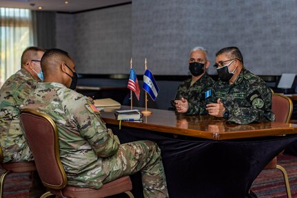 U.S. and Honduran army delegations speak during the CENTAM Working Group Meeting of Principles in Guatemala City, Guatemala, March 22, 2022. U.S. Army South Commanding General, Maj. Gen. William L. Thigpen, and Honduran army Inspector General of the Honduran Armed Forces, Gen. Omar Adalid Videa Espinal, discussed the current and future relationship between the U.S. and Honduran Armies and signed a non-binding bilateral agreement outlining the framework for coordinated activities and partnership opportunities. Delegations from the U.S., Guatemalan, El Salvadorian and Honduran armies were in attendance for the working group and discussed the upcoming CENTAM Guardian, which is a regional exercise designed to simulate regional threats and practice a combined response.