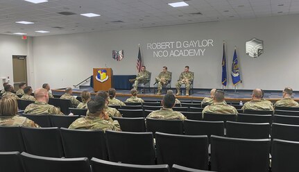 Senior leaders answer questions during a commanders' panel during the 960th Cyberspace Wing first sergeants' council additional-duty first sergeants’ symposium March 8, 2022, at Joint Base San Antonio-Lackland, Texas. More than 55 Reserve, Guard and active-duty personnel attended the event. (U.S. Air Force photo by Master Sgt. Shatasha Estes)