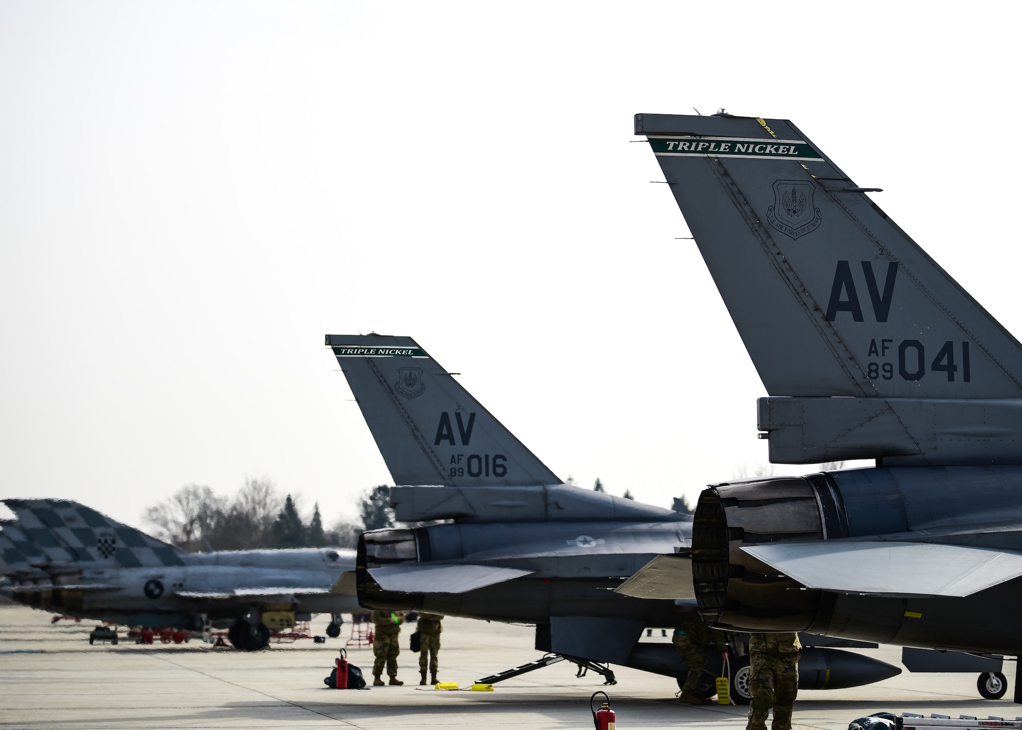 Two U.S. Air Force F-16C Fighting Falcon aircraft assigned to the 555th Fighter Squadron from the 31st Fighter Wing, Aviano Air Base, Italy, fire up jets next to Croatian MiG-21 aircraft assigned to the 191st Fighter Squadron at Croatia’s 91st Air Base at Pleso, March 17, 2022. The 31st FW executed routine Agile Combat Employment operations with Croatian Allies during this flight. Interoperability in Croatia will build Allied and partner capabilities throughout Southeast Europe and into the Mediterranean Sea. (U.S. Air Force photo by Tech. Sgt. Miquel Jordan)