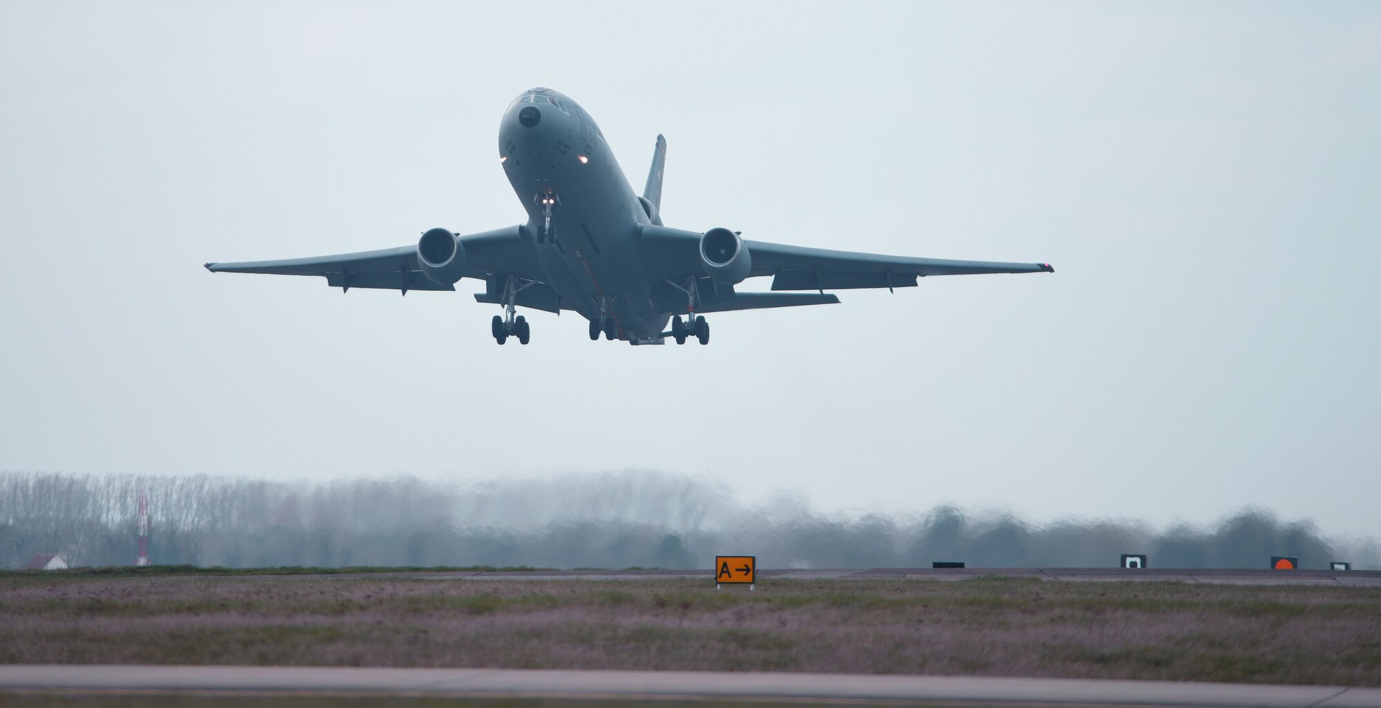 A U.S. Air Force KC-10 Extender aircraft assigned to the 305th Air Mobility Wing, Joint Base McGuire-Dix-Lakehurst, N.J., takes off from Royal Air Force Mildenhall, England, March 9, 2022. The KC-10 is an Air Mobility Command advanced tanker and cargo aircraft designed to provide increased global mobility for U.S. Armed Forces. (U.S. Air Force photo by Karen Abeyasekere)