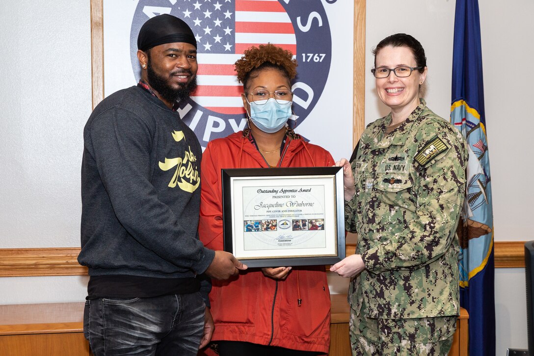 Shop 57 Insulator Jacqueline Winborne was recently named the Department of Labor's Apprentice of the Year for 2022 during a virtual ceremony Jan. 31. She was presented the award by Capt. Dianna Wolfson and Supervisor Delmonta Palmer Mar. 16.