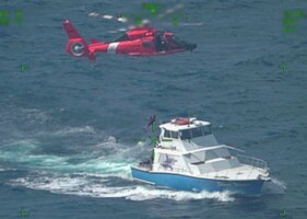 MH-65 crew rescues shark victim near Bahamas