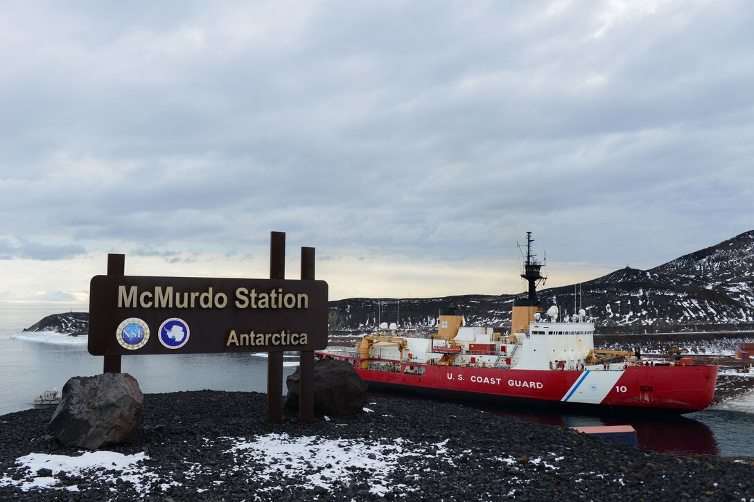 Cutter Polar Star moors up to ice pier in Antarctica