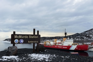 Cutter Polar Star moors up to ice pier in Antarctica