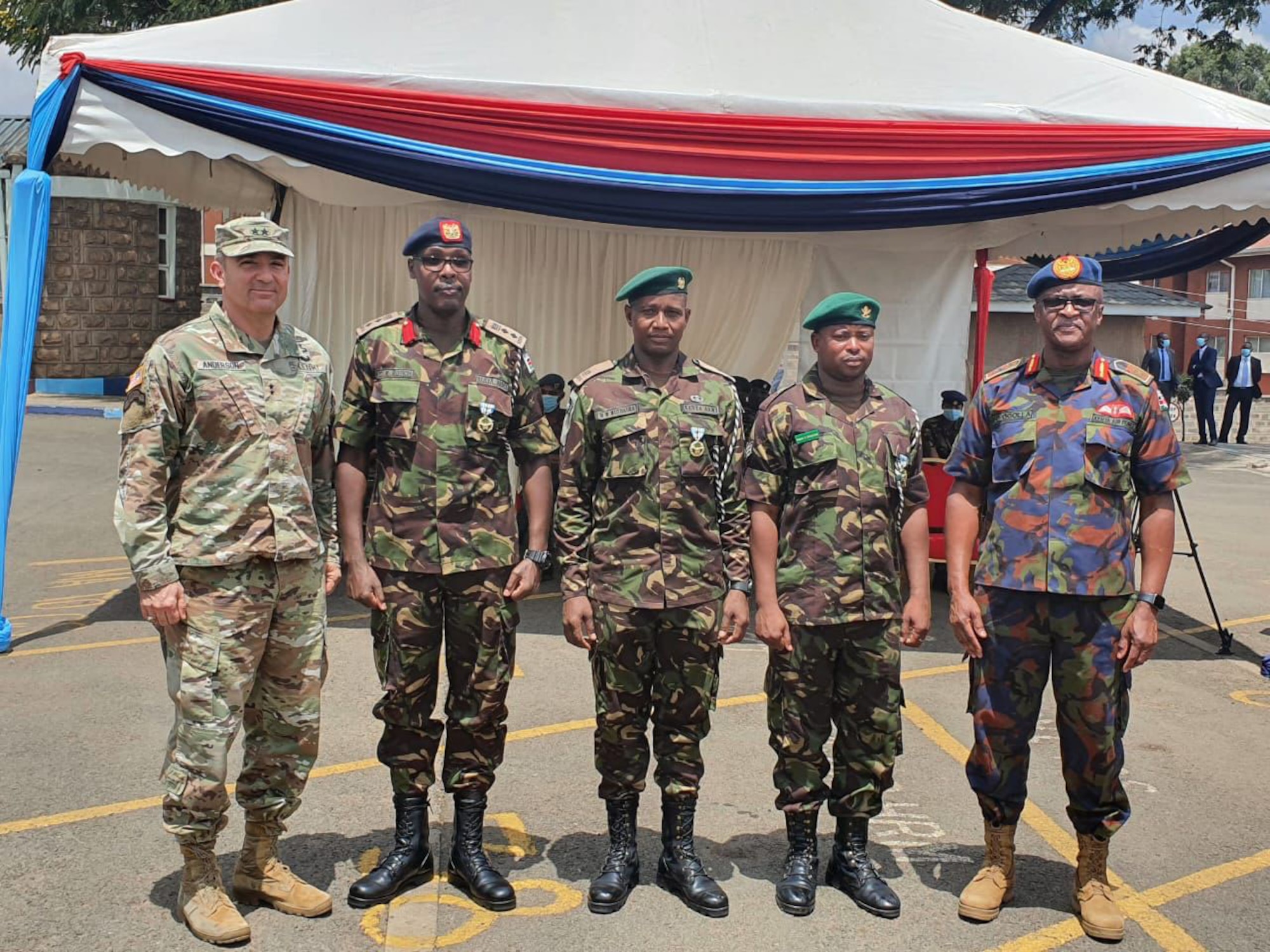 U.S. Army Major General Gregory Anderson, U.S. Africa Command Director of Operations, awarded the U.S. Joint Service Commendation Medal for valor to Kenyan Defense Forces (KDF) Colonel Daniel Rotich, Major Martin Muthaura, and Corporal Peter Shikuri, for their exemplary courage and selflessness during the Jan. 5, 2020, Manda Bay attack, Manda Bay, Kenya, March 16, 2022. The U.S. and KDF have a strong 60-year relationship that includes hosting regional exercises and serving alongside U.S Forces in contingency operations. (U.S. Air Force courtesy photo)