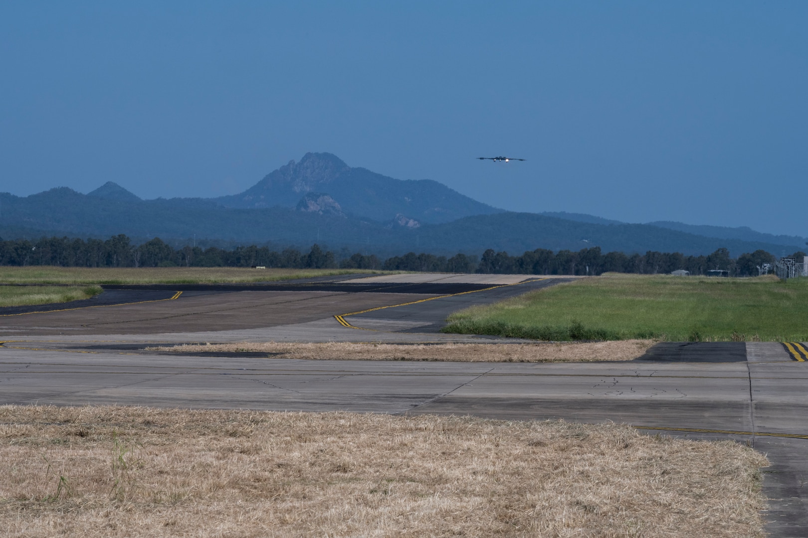 A B-2 Spirit prepares to land at Royal Australian Air Force Base Amberley, Australia after conducting integration with RAAF and U.S. fighters during a training mission in the Indo-Pacific region, March 23, 2022. The mission provided an opportunity to train and work with our allies and partners in joint and coalition operations and exercises. (U.S. Air Force photo by Tech. Sgt. Hailey Haux)