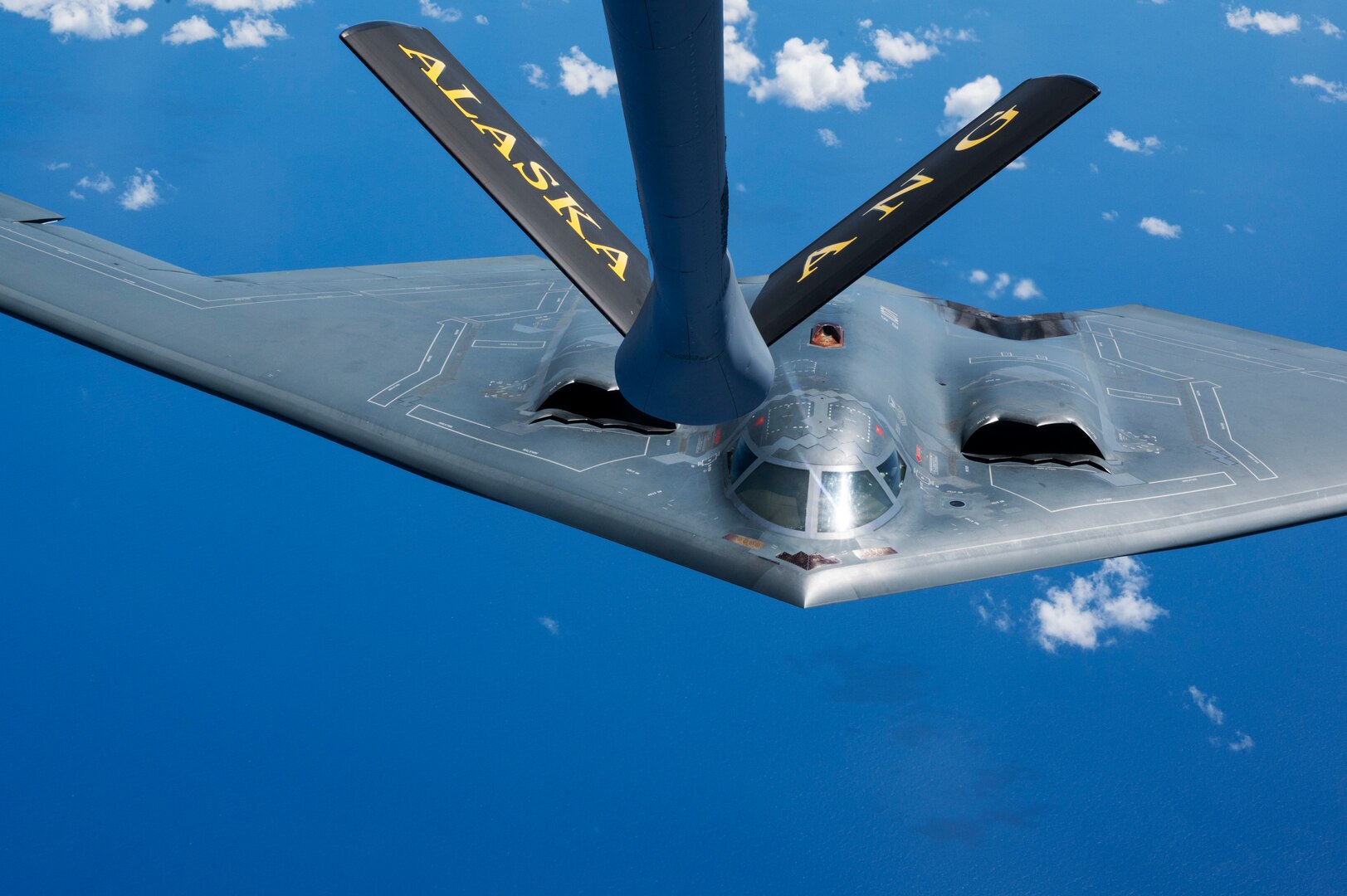 A B-2 Spirit from Whiteman Air Force Base, Missouri, prepares to conduct aerial refueling operations with a KC-135 Stratotanker from the Alaska Air National Guard, during a training mission in the Indo-Pacific region, March 23, 2022. Once in Australian airspace, the B-2 crews from the 509th Bomb Wing teamed up with the tanker before integrating with eight fighter aircraft—two RAAF F-35A Lightning IIs, two Royal Australian Air Force EA-18 Growlers, two RAAF Super Hornets and two U.S. Air Force F-16C Aggressors —to conduct training operations. (U.S. Air Force photo by Tech. Sgt. Hailey Haux)