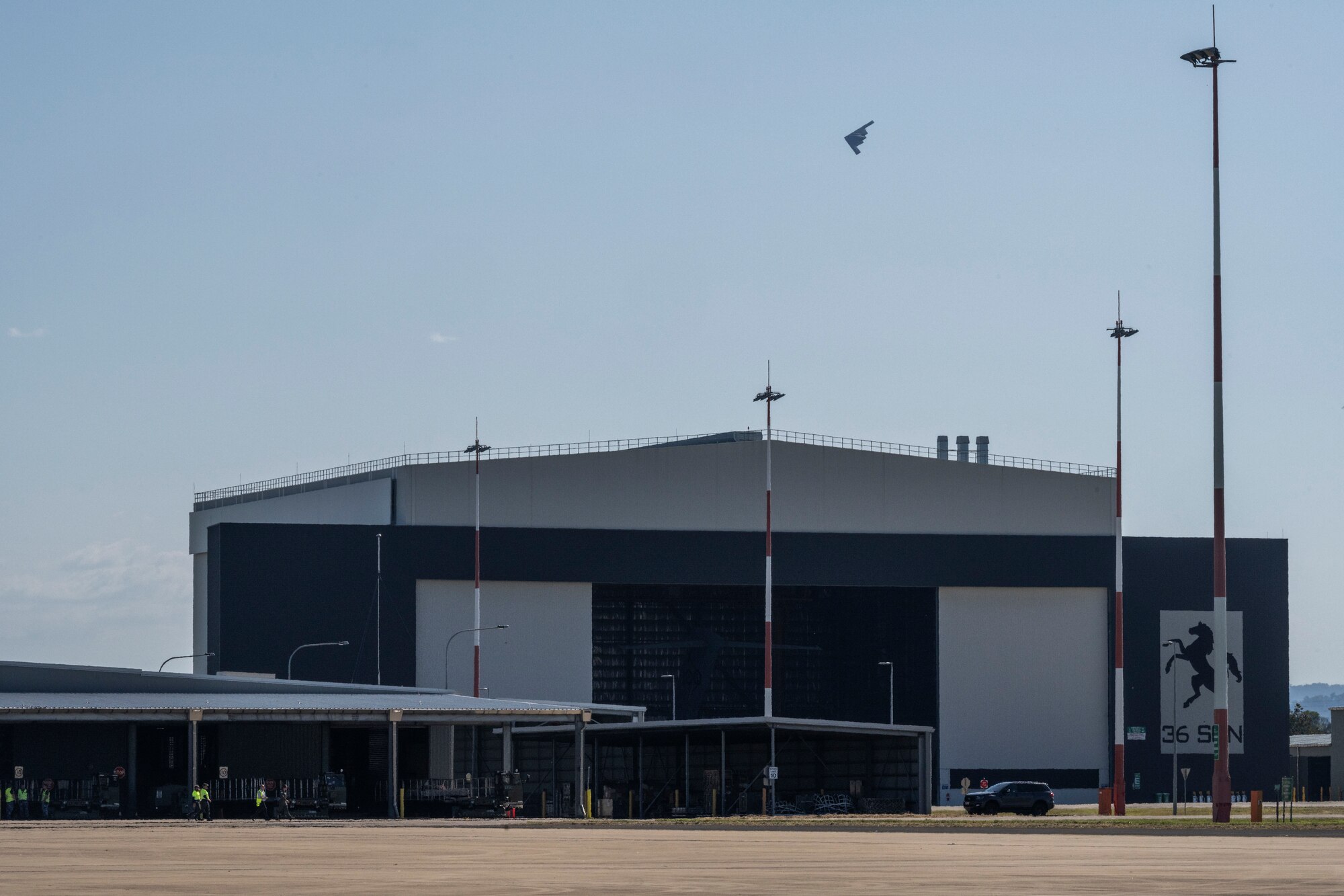 A B-2 Spirit prepares to land at Royal Australian Air Force Base Amberley, Australia  after conducting integration with RAAF fighter aircraft during a training mission in the Indo-Pacific region, March 23, 2022. During the more than 50-hour round-trip trek to Australia and back, the B-2 received aerial refueling from numerous tanker aircraft—ensuring the mission was successful and further demonstrating the U.S. Air Forces’ global strike capabilities. The presence of U.S. aircraft and personnel in Australia underscores the U.S. commitment to the Indo- Pacific region in an unpredictable and uncertain environment. (U.S. Air Force photo by Tech. Sgt. Hailey Haux)