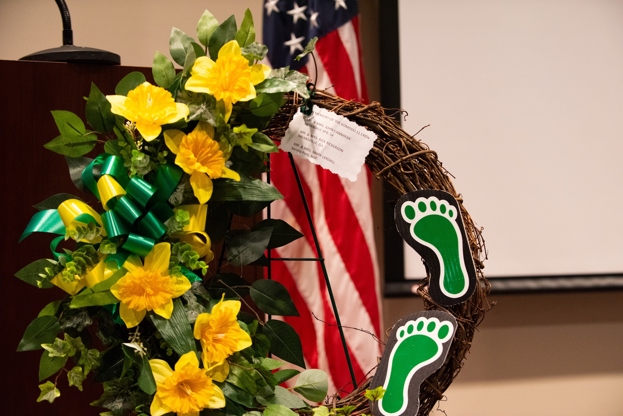 A memorial wreath is displayed to honor Komodo 11 during a ceremony at Moody Air Force Base, Georgia, March 23, 2022. Komodo 11 was an HH-60G Pavehawk that crashed, resulting in the loss of six Airmen’s lives, during a humanitarian rescue mission in Afghanistan, March 23, 2003. (U.S. Air Force photo by Airman 1st Class Courtney Sebastianelli)