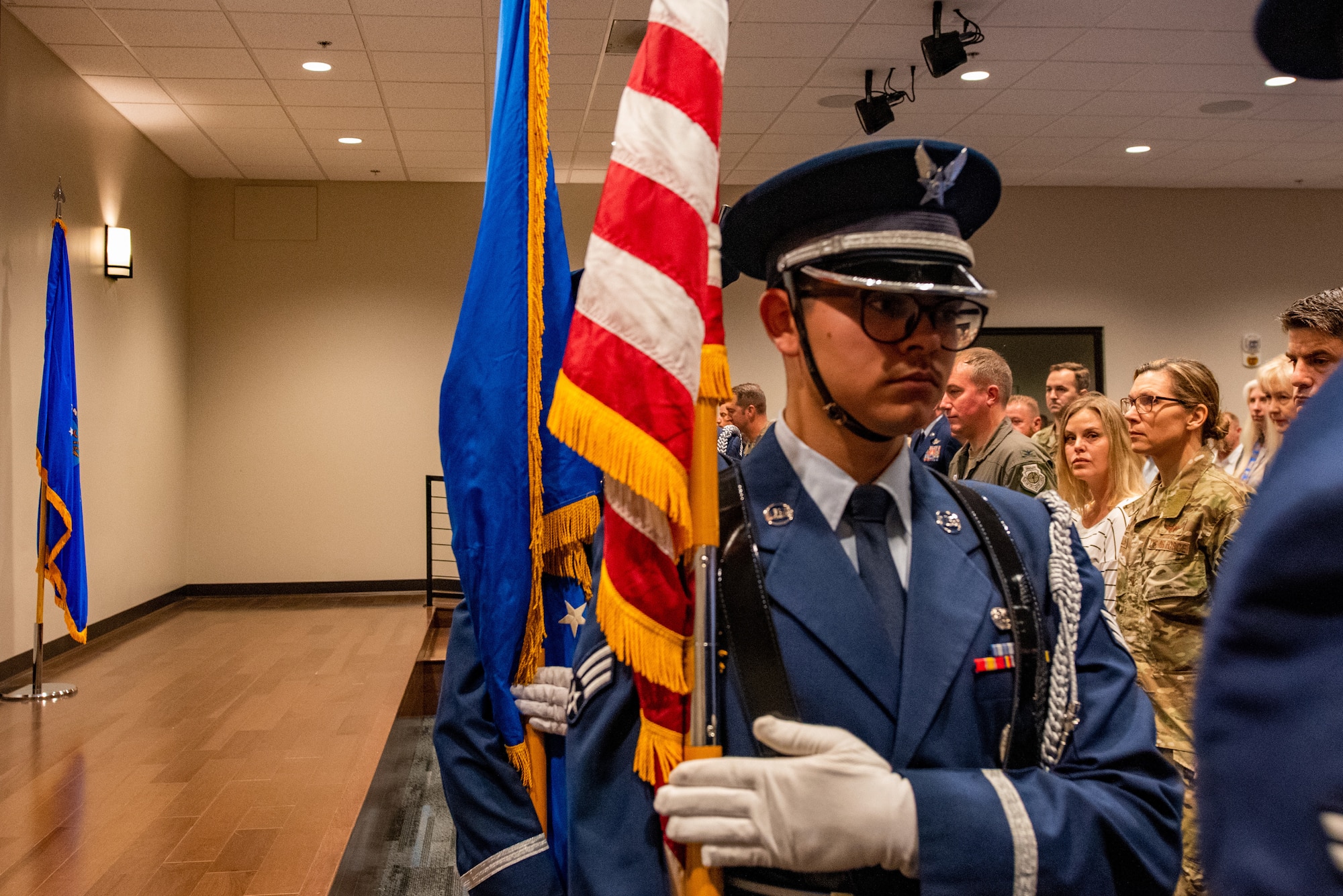 U.S. Air Force Honor Guard members present the colors during a Komodo 11 memorial ceremony at Moody Air Force Base, Georgia, March 23, 2022. Komodo 11 was an HH-60G Pavehawk that crashed, resulting in the loss of six Airmen’s lives, during a humanitarian rescue mission in Afghanistan, March 23, 2003. (U.S. Air Force photo by Airman 1st Class Courtney Sebastianelli)