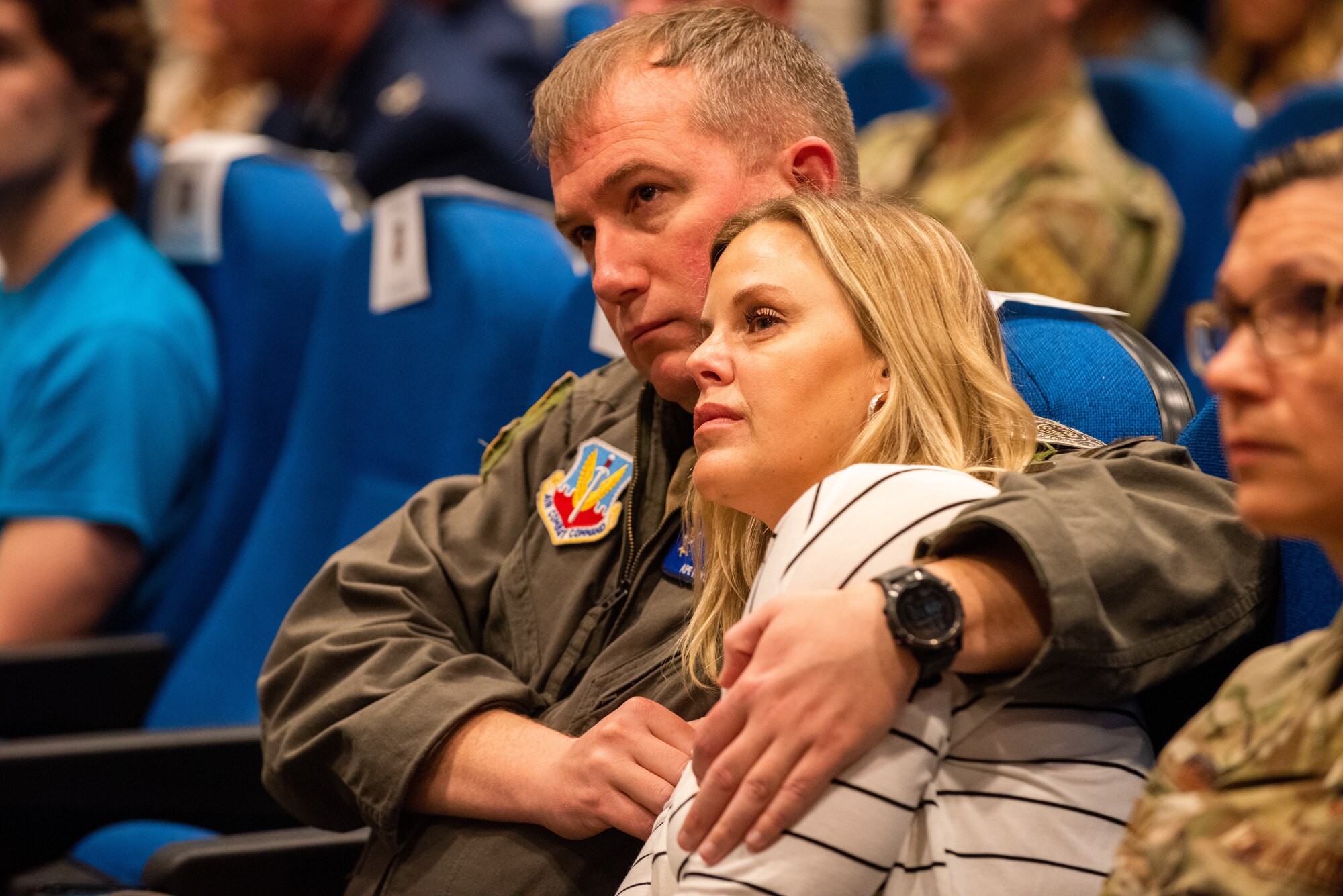 U.S. Air Force Col. Ryan Hayde, 23rd Wing vice commander, comforts Cristy Hicks Stack, widow of Staff Sgt. Jason Hicks, during a memorial ceremony for Komodo 11 at Moody Air Force Base, Georgia, March 23, 2022. The late Staff Sgt. Hicks was on board Komodo 11 along with five other crew members when it tragically crashed in Afghanistan during a humanitarian mission in 2003. (U.S. Air Force photo by Airman 1st Class Courtney Sebastianelli)