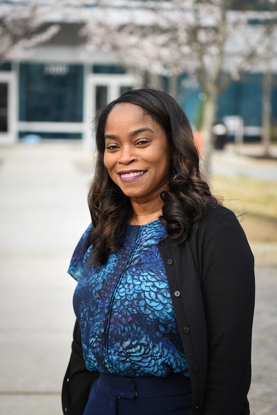 Denise Hurt, security specialist, poses for a photo outside of the U.S. Army Corps of Engineers, Baltimore District, Real Property Services Field Office (RSFO) in Annapolis Junction, Maryland, March 24, 2022. Hurt is part of an all-women security team at RSFO. (U.S. Army photo by Thomas I. Deaton)