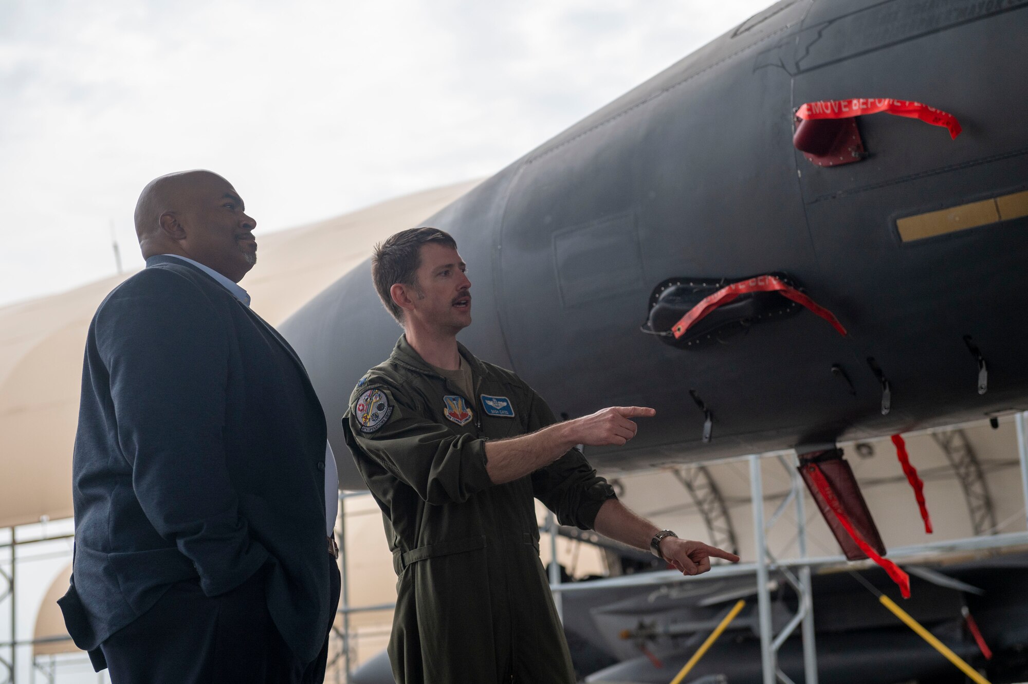 Lt. Col. Joshua Cates, Deputy Commander of the 4th Operations Group, and Mark Robinson, North Carolina Lt. Gov., tour the flightline at Seymour Johnson Air Force Base, North Carolina, March 23, 2022. Robinson was elected as the 35th Lt. Gov. of North Carolina in 2021. (U.S. Air Force photo by Senior Airman Kevin Holloway)