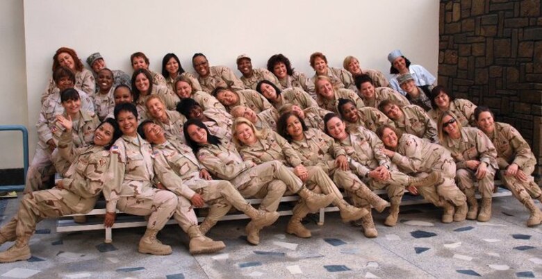 Afghanistan Team Photo: Kris Mullins and her teammates pose for a group photo during her deployment to Afghanistan. Mullins said her deployment to Afghanistan has been one of the highlights of her career. (Courtesy photo)