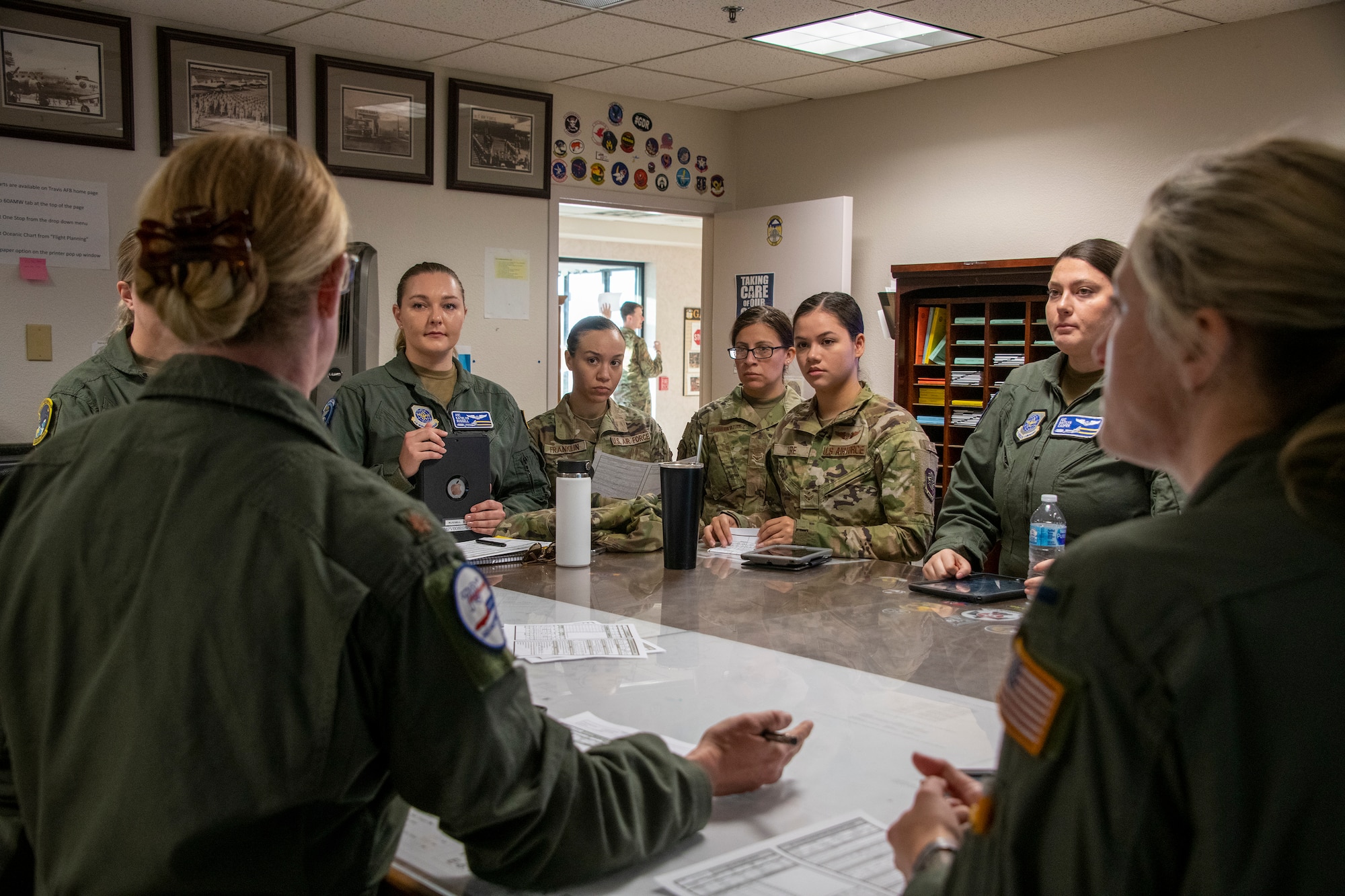 U.S. Air Force aircrew attend a pre-flight briefing at Travis Air Force Base, California, March 22, 2022. In honor of Women's History Month, an all-female KC-10 flight crew from the 60th and 349th Air Mobility Wings flew on an aerial refueling training mission over California and Oregon. (U.S. Air Force photo by Heide Couch)