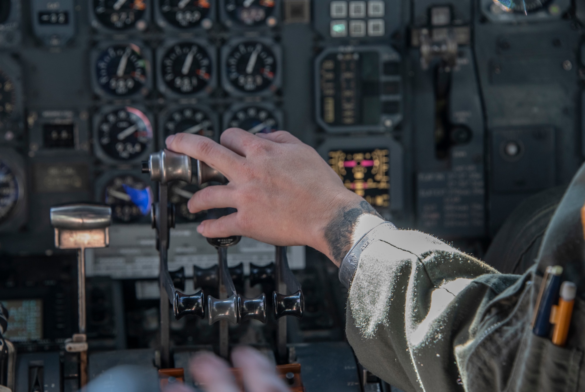 U.S. Air Force 1st Lt. Macy Miller, 6th Air Refueling Squadron KC-10 Extender pilot, adjusts the controls during Women’s History Month heritage flight at Travis Air Force Base, California, March 22, 2022. In honor of Women's History Month, an all-female KC-10 flight crew from the 60th and 349th Air Mobility Wings flew on an aerial refueling training mission over California and Oregon. (U.S. Air Force photo by Heide Couch)