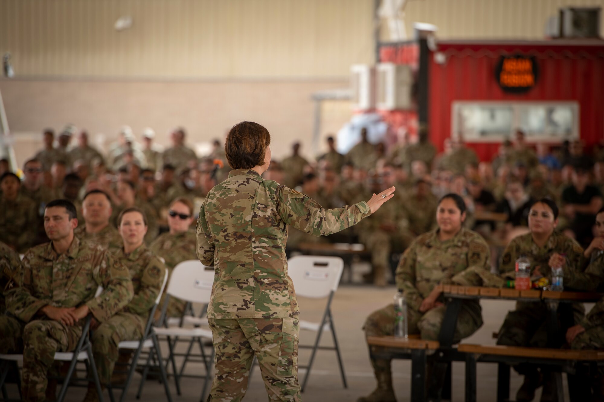Chief Master Sgt. of the Air Force JoAnne S. Bass speaks to service members during an all-call