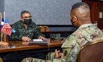 U.S. and Honduran army delegations speak during the CENTAM Working Group