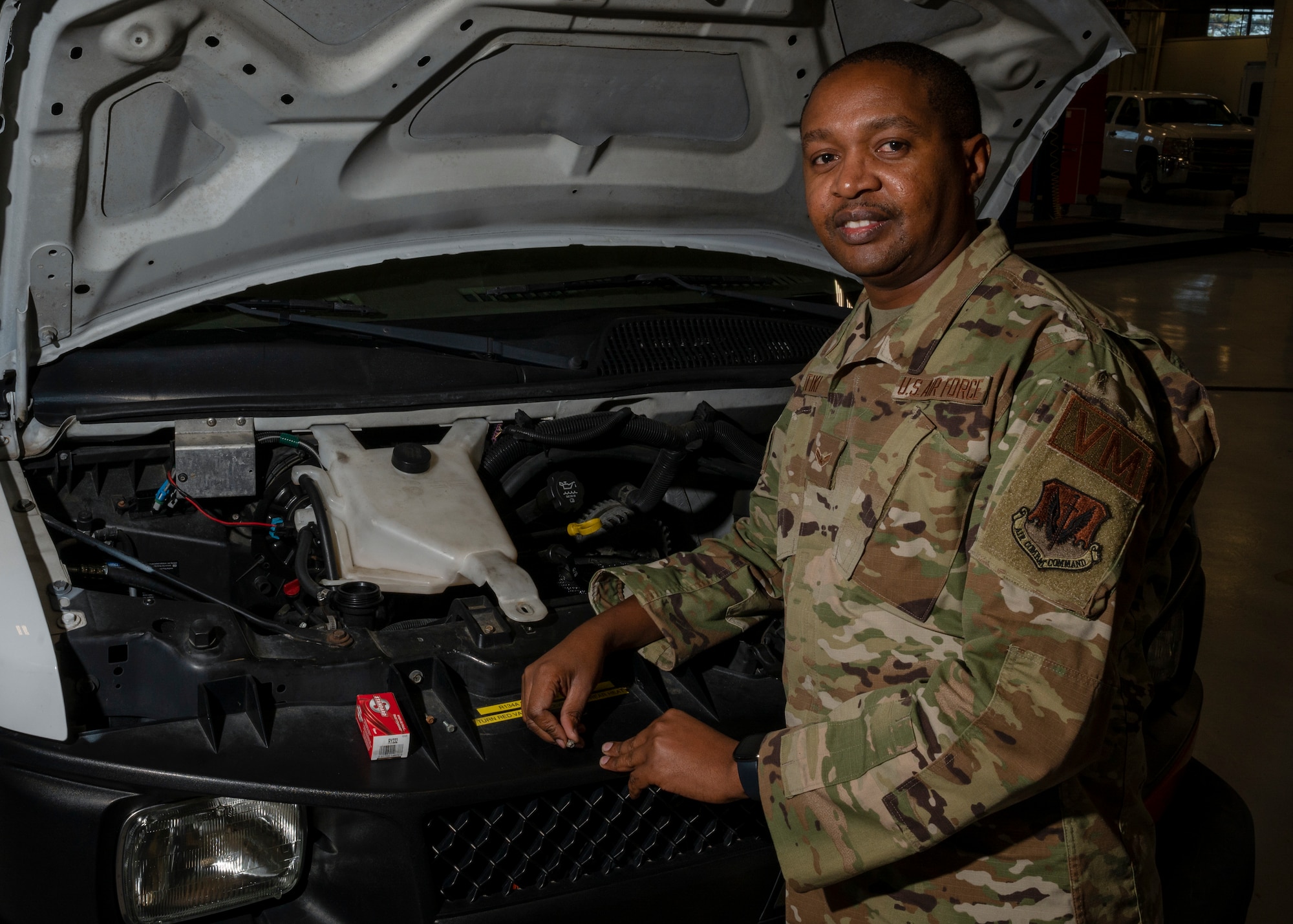 Airman 1st Class Bethwel Waitiki, 4th Logistics Readiness Squadron vehicle maintenance technician, poses for a photo at Seymour Johnson Air Force Base, North Carolina, March 3, 2022.