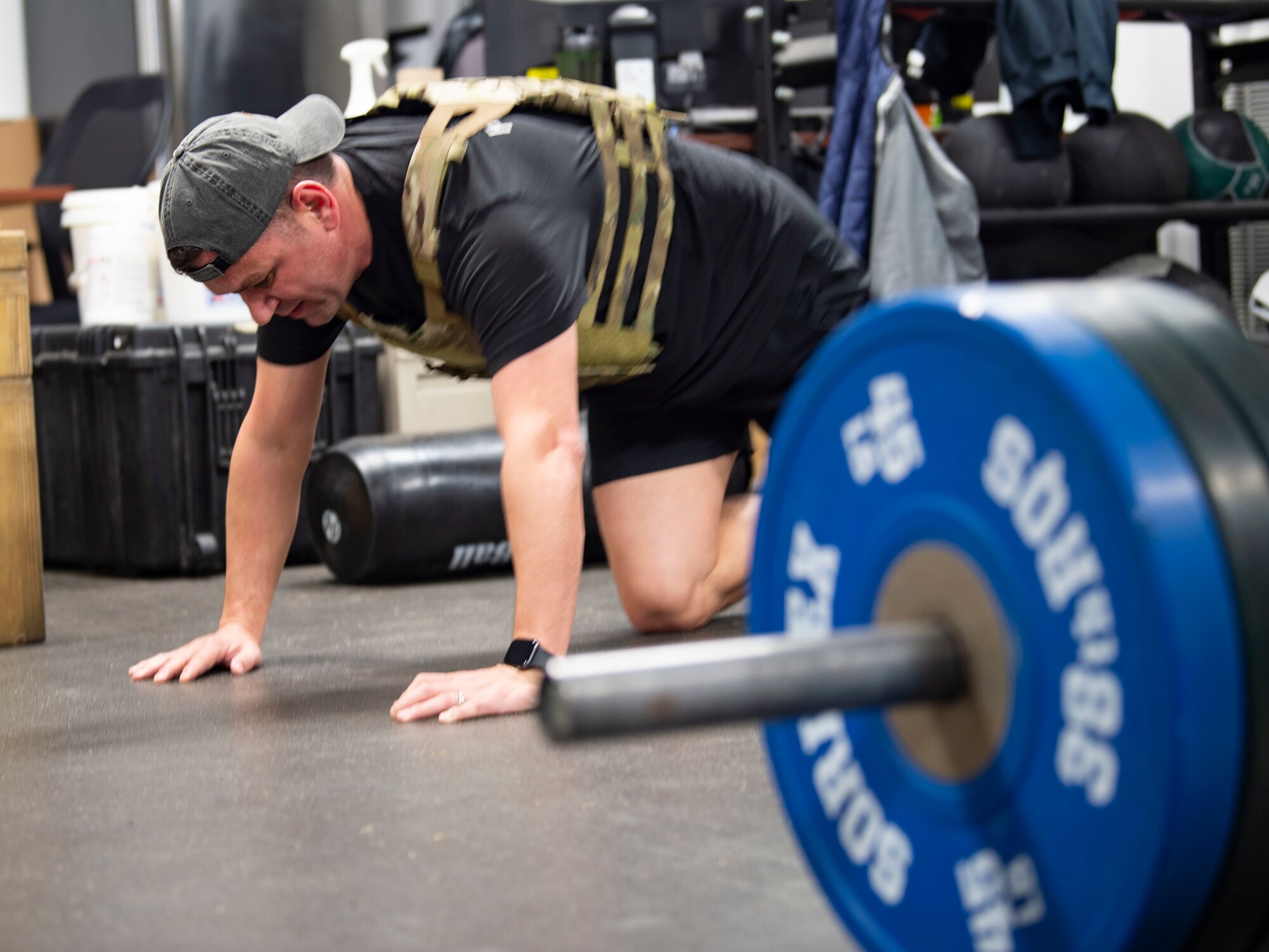 A photo of a man doing a push up.