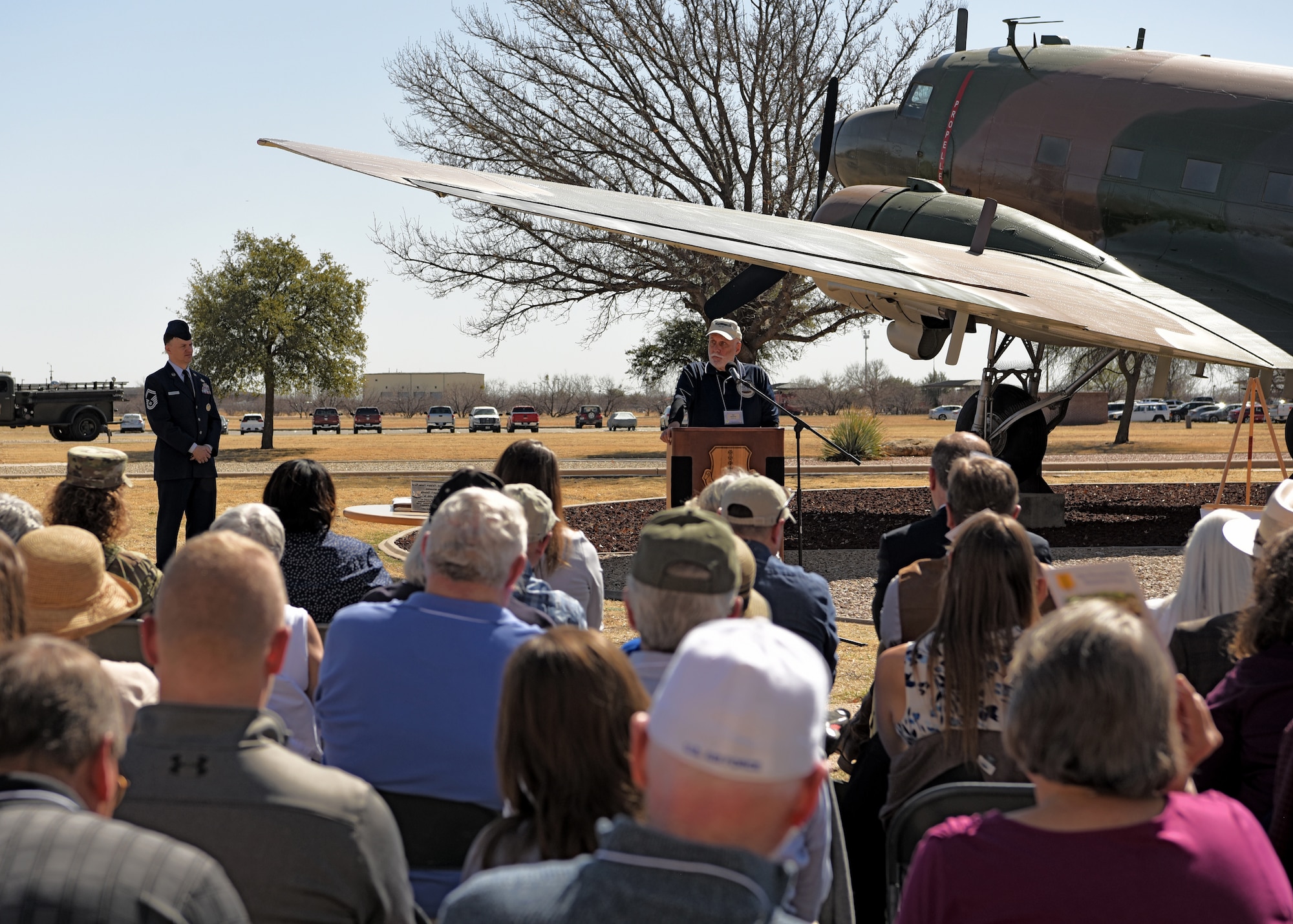Mr. Joe Martin, U.S. Air Force veteran, speaks at the dedication of the Weyandt-Eddy Memorial Plaza at Goodfellow Air Force Base, Texas, March 25, 2022. Martin’s speech paid tribute to Lt. Col. David H. Eddy. (U.S. Air Force photo by Senior Airman Abbey Rieves)