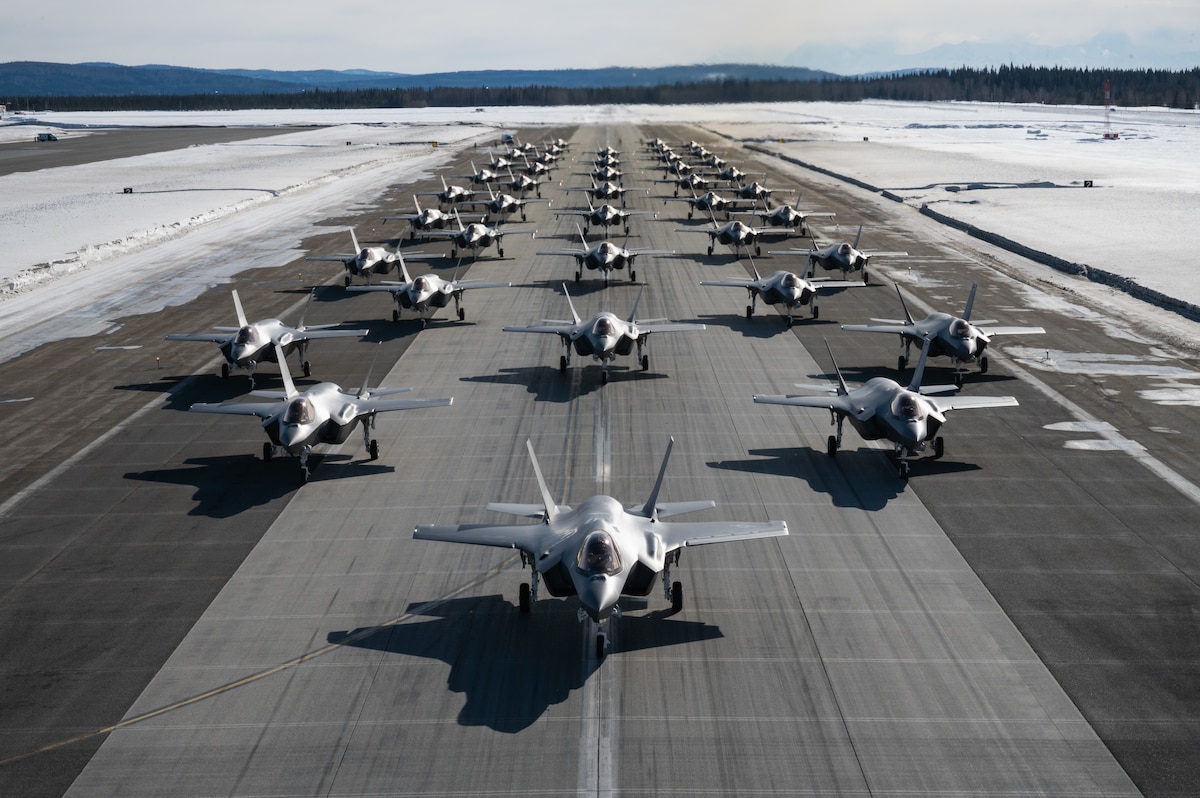 A formation of 42 F-35A Lightning IIs during a routine readiness exercise at Eielson Air Force Base, Alaska, March 25, 2022. The formation demonstrated the 354th Fighter Wing’s ability to rapidly mobilize fifth-generation aircraft in arctic conditions. (U.S. Air Force photo by Airman 1st Class Jose Miguel T. Tamondong)