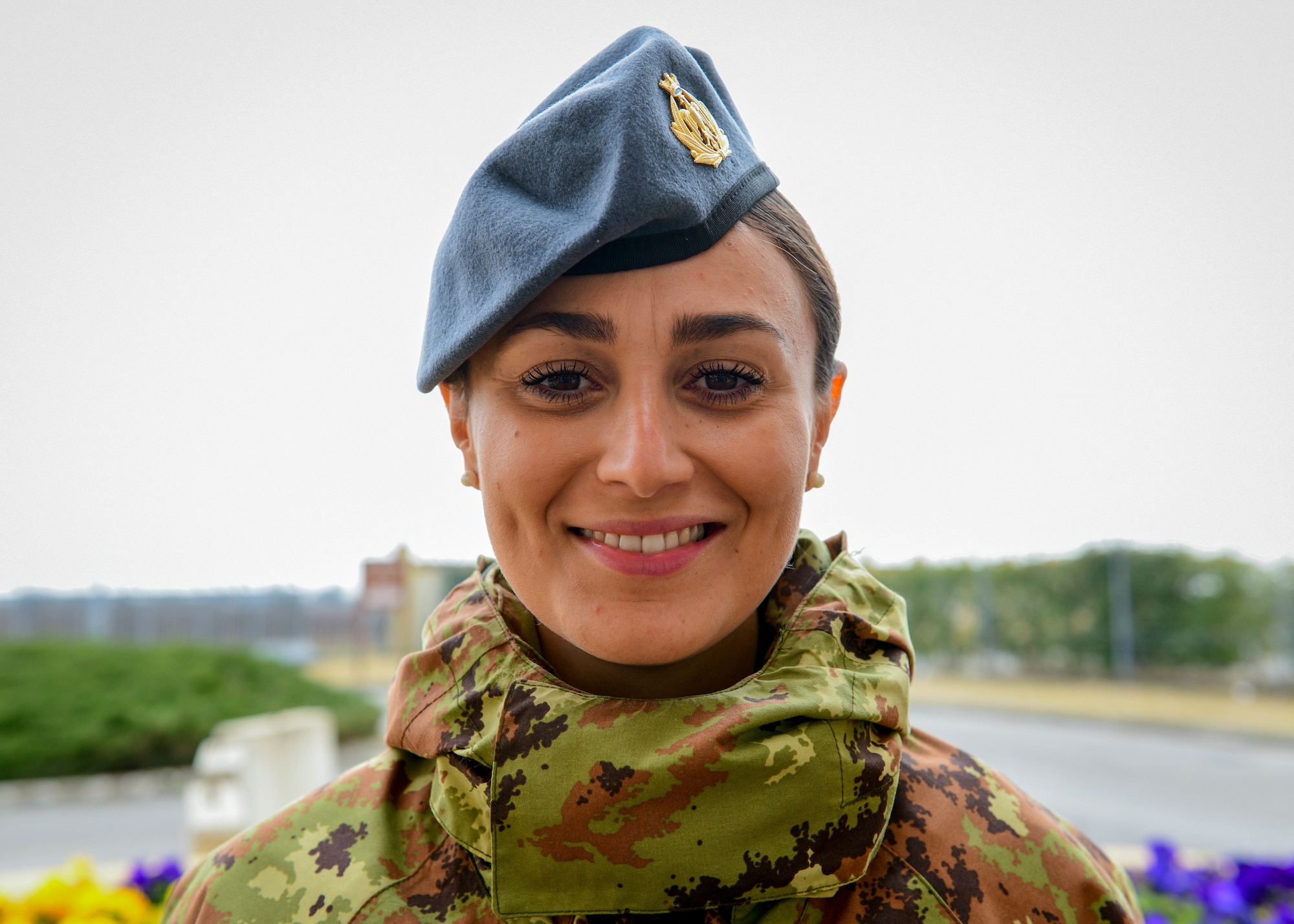 Italian air force Senior Master Sgt. Cristina Deligia, Italian air force Security Forces Squadron force protection operator, poses for a photo at Aviano Air Base, Italy, March 16, 2022. Deligia joined the Italian air force June 2, 2018, and arrived to Aviano July 2021. The 31st Fighter Wing celebrates Women’s History Month alongside the Italian air force throughout the month of March with events such as a ruck march, luncheon, all-women’s panel and more. (U.S. Air Force photo by Senior Airman Brooke Moeder)