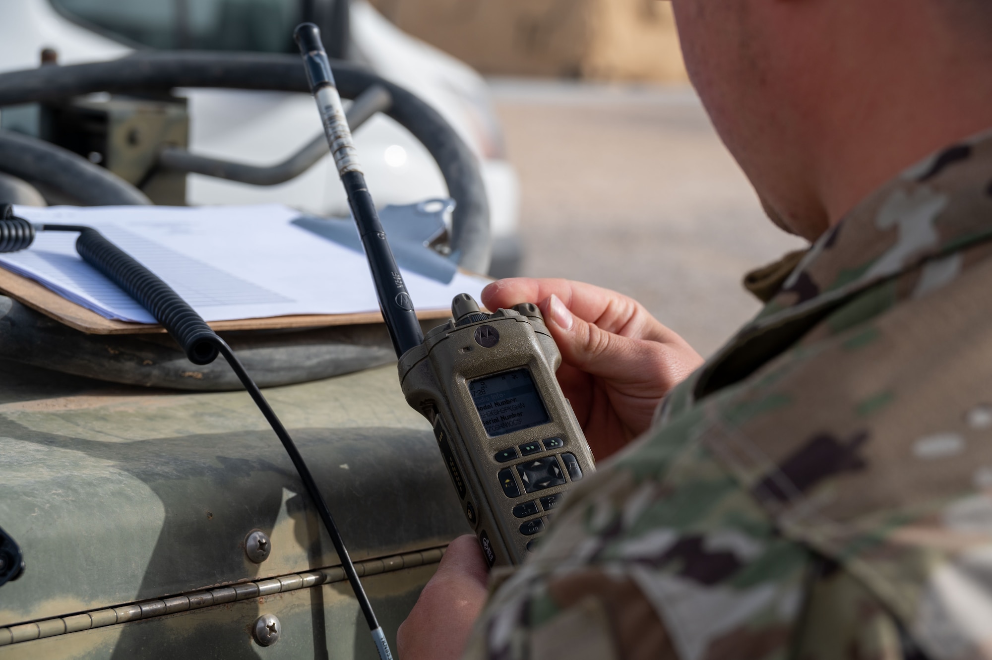 A 332d Expeditionary Communication Squadron Airman completes a monthly Land Mobile Radio rekey at an undisclosed location in Southwest Asia, March 17, 2022. LMRs, encrypted two-way radios, are used by first responders, air crew, airfield management and others to relay and receive day-to-day and emergency communications regarding security and mission. The 332d ECS provides a broad range of communication services to the 332d AEW workforce to win the fight today as well as tomorrow - building on the Red Tail legacy of excellence. (U.S. Air Force photo by Tech. Sgt. Lauren M. Snyder.)