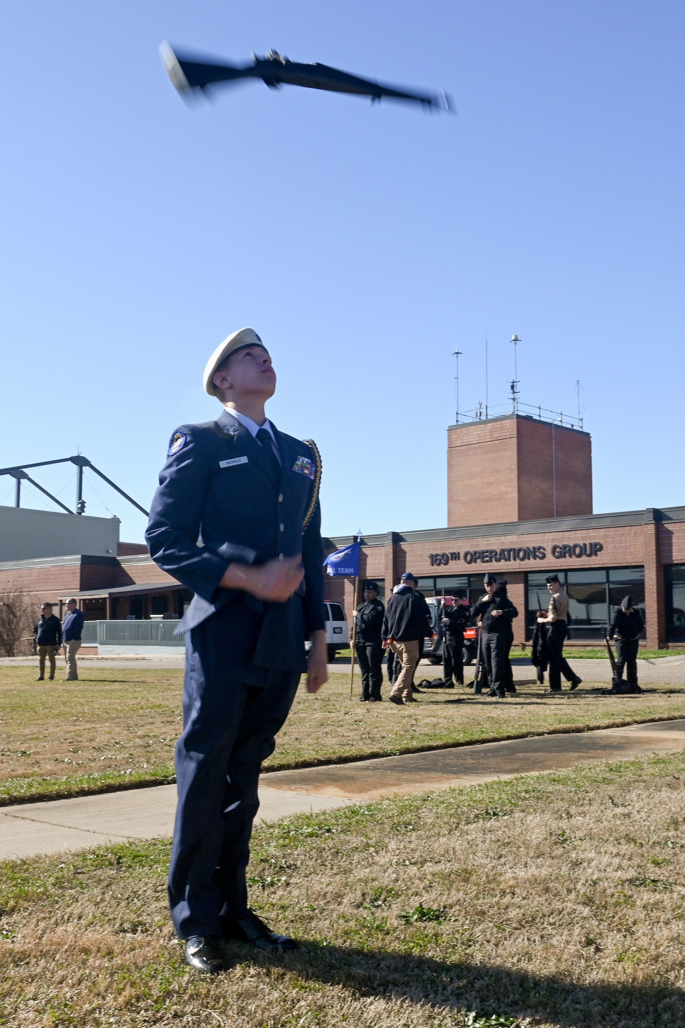 A student from the Sumter High School IDR Individual team from Sumter, South Carolina practices before his event during the annual Top Gun Drill Meet at McEntire Joint National Guard Base, South Carolina, March 26, 2022. High School Junior Reserve Officers Training Corps cadets from twenty high schools from across the state competed in twelve drill and ceremony events sponsored by the South Carolina Air National Guard. (U.S. Air National Guard photo by Tech. Sgt. Megan Floyd, 169th Fighter Wing Public Affairs)