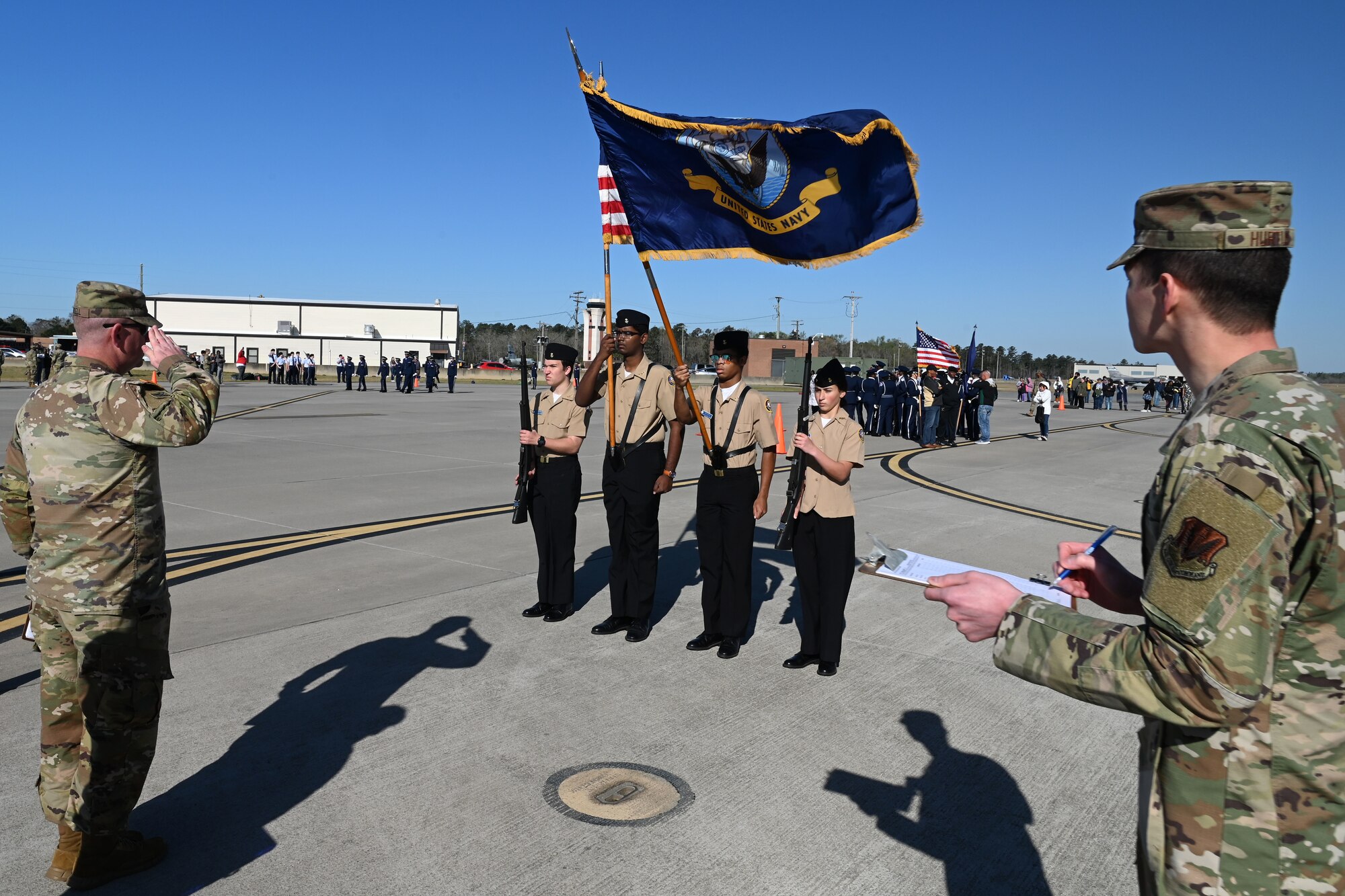 The Dreher High School ‘Color Guard’ team from Columbia, South Carolina competes during the annual Top Gun Drill Meet at McEntire Joint National Guard Base, South Carolina, March 26, 2022. High School Junior Reserve Officers Training Corps cadets from twenty high schools from across the state competed in twelve drill and ceremony events sponsored by the South Carolina Air National Guard. (U.S. Air National Guard photo by Senior Master Sgt. Edward Snyder)