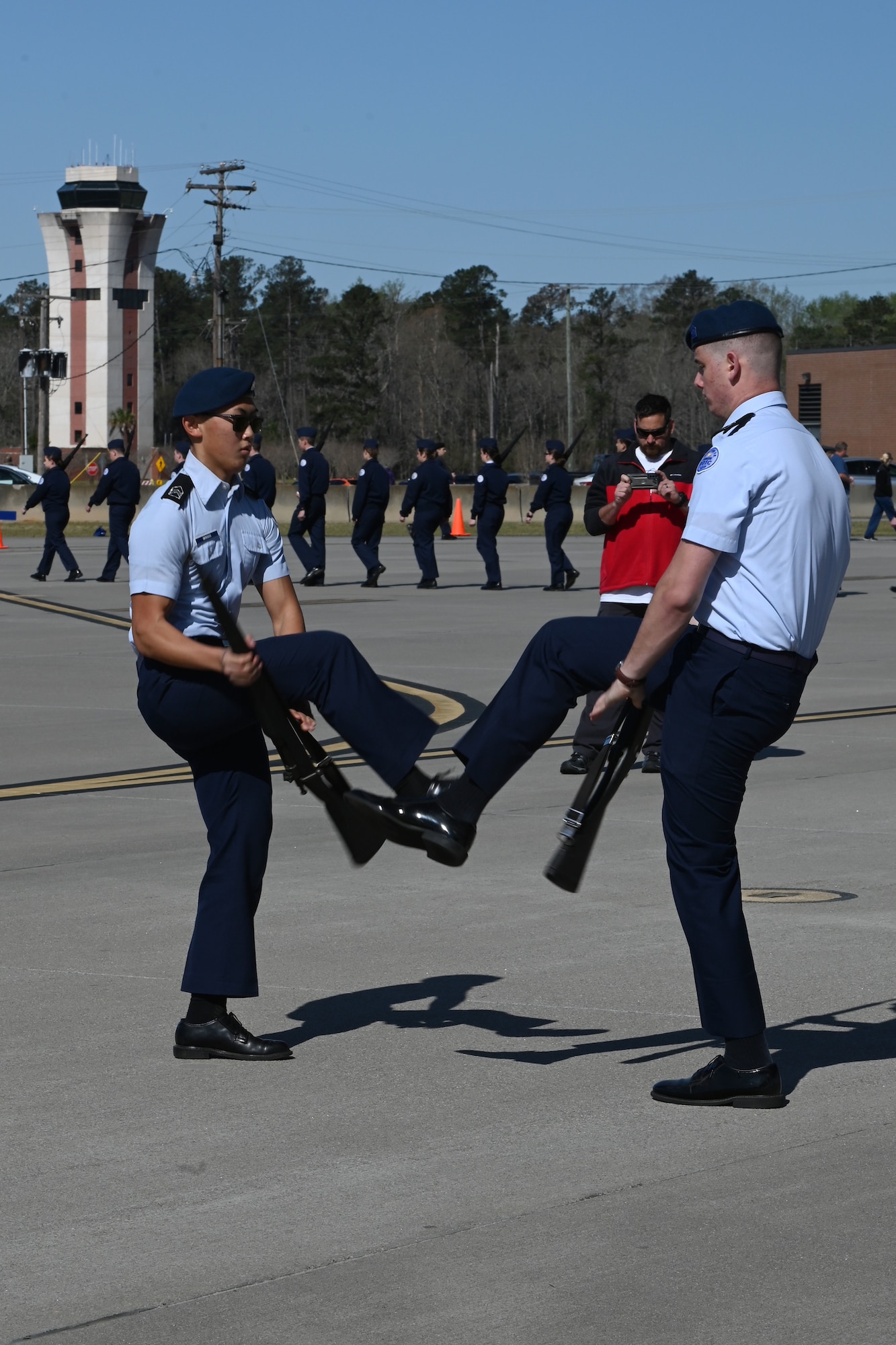 The Beaufort High School ‘Fancy Duet Armed’ team from Beaufort, South Carolina competes during the annual Top Gun Drill Meet at McEntire Joint National Guard Base, South Carolina, March 26, 2022. High School Junior Reserve Officers Training Corps cadets from twenty high schools from across the state competed in twelve drill and ceremony events sponsored by the South Carolina Air National Guard. (U.S. Air National Guard photo by Senior Master Sgt. Edward Snyder)