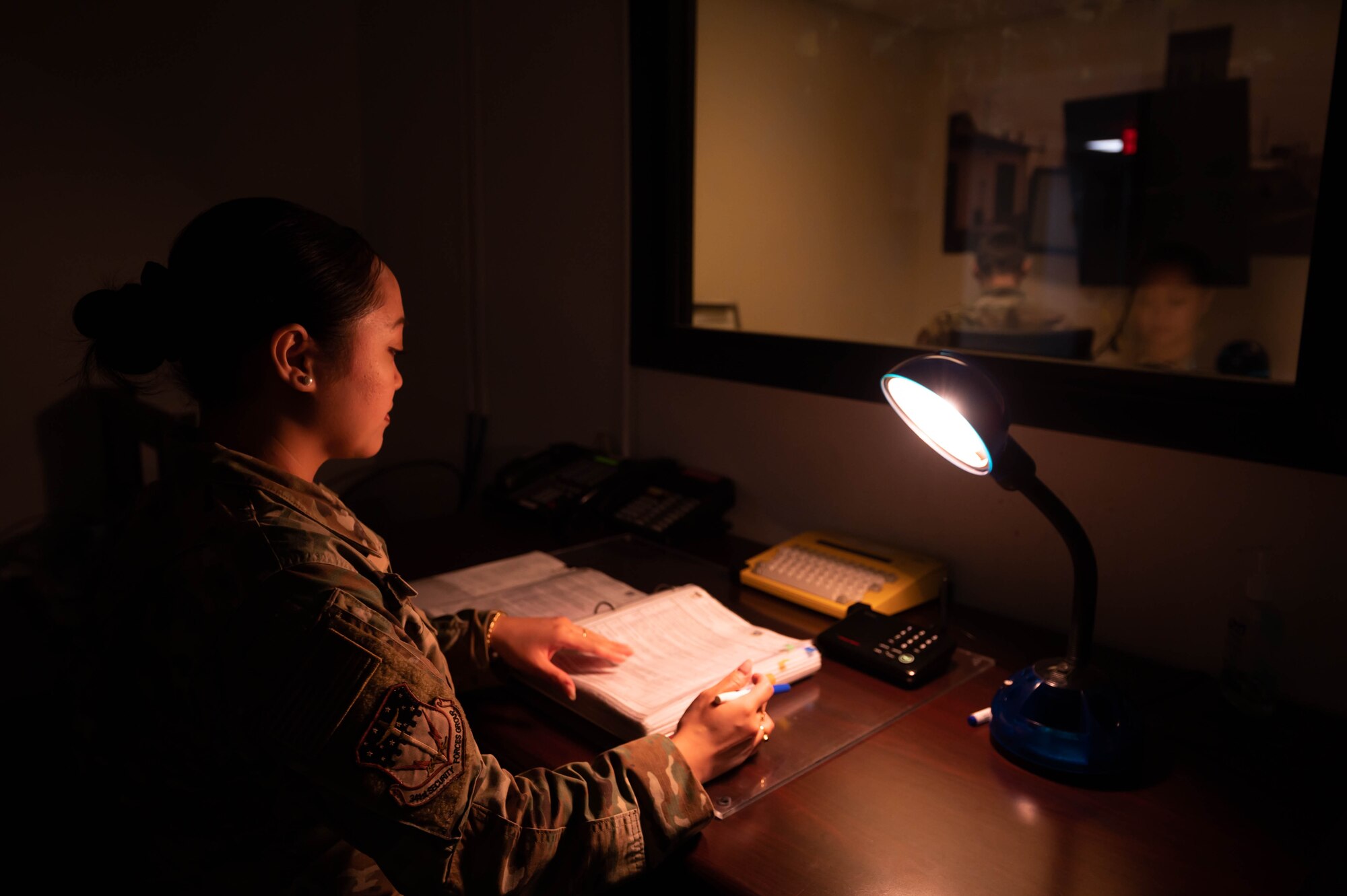 Staff Sgt. Grace Ibrahim, 341st Security Forces Group evaluator, demonstrates a field security controller evaluation with Staff Sgt. Timothy Hostetler, 341st SFG evaluator, March 23, 2022, at Malmstrom Air Force Base, Mont.