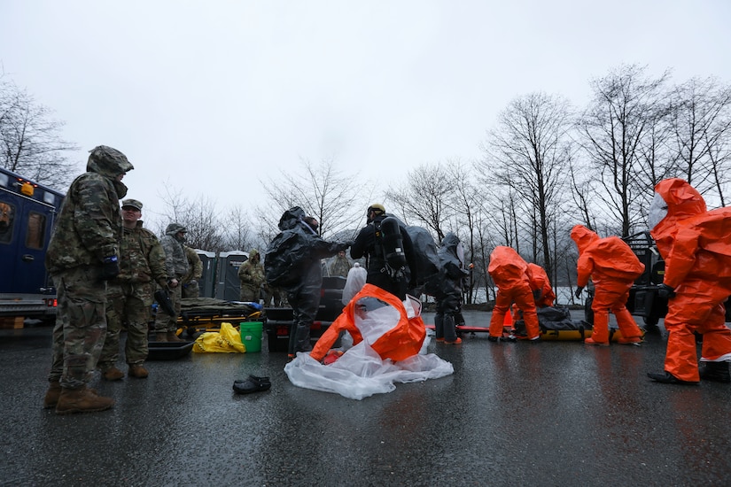 Guardsmen from the Alaska and Montana National Guard prepare for down-range operations during exercise Van Winkle 2022 in Juneau, Alaska, March 22. Van Winkle 2022 is a chemical, biological, radiological, nuclear and explosive response exercise designed to enhance interoperability between state, federal and local first responders with complex training scenarios. Exercise participants included CST units from the Alaska National Guard, Montana National Guard, Connecticut National Guard, Mississippi National Guard and North Carolina National Guard. (U.S. Army National Guard photo by Victoria Granado)