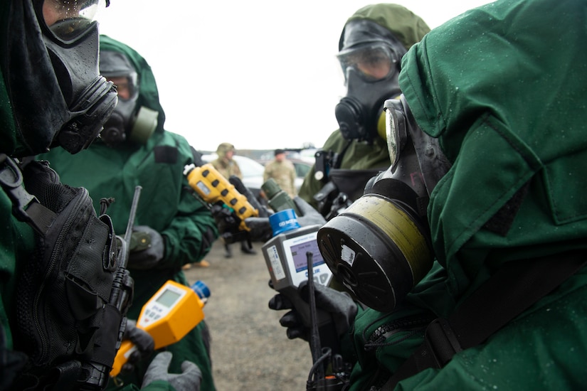 Civil Support Team members from the Alaska and Montana National Guard coordinate before inspecting a simulated plane crash for radioactive contamination during exercise Van Winkle 2022 in Juneau, Alaska, March 23. Van Winkle 2022 is a chemical, biological, radiological, nuclear and explosive response exercise designed to enhance interoperability between state, federal and local first responders with complex training scenarios. Exercise participants included CST units from the Alaska National Guard, Montana National Guard, Connecticut National Guard, Mississippi National Guard and North Carolina National Guard. (U.S. Army National Guard photo by Victoria Granado)