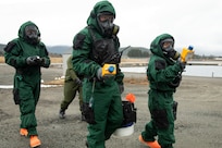 Civil Support Team members from the Alaska and Montana National Guard approach a simulated plane crash to inspect for radioactive contamination during exercise Van Winkle 2022 in Juneau, Alaska, March 23. Van Winkle 2022 is a chemical, biological, radiological, nuclear and explosive response exercise designed to enhance interoperability between state, federal and local first responders with complex training scenarios. Exercise participants included CST units from the Alaska National Guard, Montana National Guard, Connecticut National Guard, Mississippi National Guard and North Carolina National Guard. (U.S. Army National Guard photo by Victoria Granado)