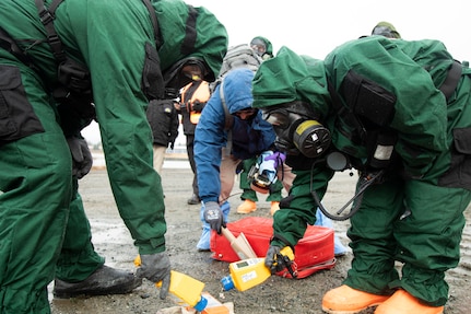 Civil Support Team members from the Alaska and Montana National Guard inspect wreckage from a simulated plane crash for radioactive contamination during exercise Van Winkle 2022 in Juneau, Alaska, March 23. Van Winkle 2022 is a chemical, biological, radiological, nuclear and explosive response exercise designed to enhance interoperability between state, federal and local first responders with complex training scenarios. Exercise participants included CST units from the Alaska National Guard, Montana National Guard, Connecticut National Guard, Mississippi National Guard and North Carolina National Guard. (U.S. Army National Guard photo by Victoria Granado)