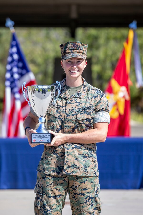 U.S. Marine 1st Lt. Riley Compton, the logistics officer with Marine Aviation Logistics Squadron 39, Marine Aircraft Group 39, 3rd Marine Aircraft Wing, poses for a photo after receiving the Camp Pendleton Female Marine Athlete of the Year award during a ceremony on Camp Pendleton, California, March 18, 2022. Compton received this honor after being nominated by her command for her various physical achievements in 2021, including becoming a developmental bobsled pilot for Team USA. Compton is a native of Carmel, Indiana. (U.S. Marine Corps photo by Cpl. Alison Dostie)