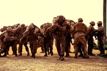 U.S. Marine Corps recruits with India Company, 3rd Recruit Training Battalion, fireman carry their fellow recruits during a simulated CASEVAC run on Marine Corps Base Camp Pendleton, Calif., March 15, 2022.