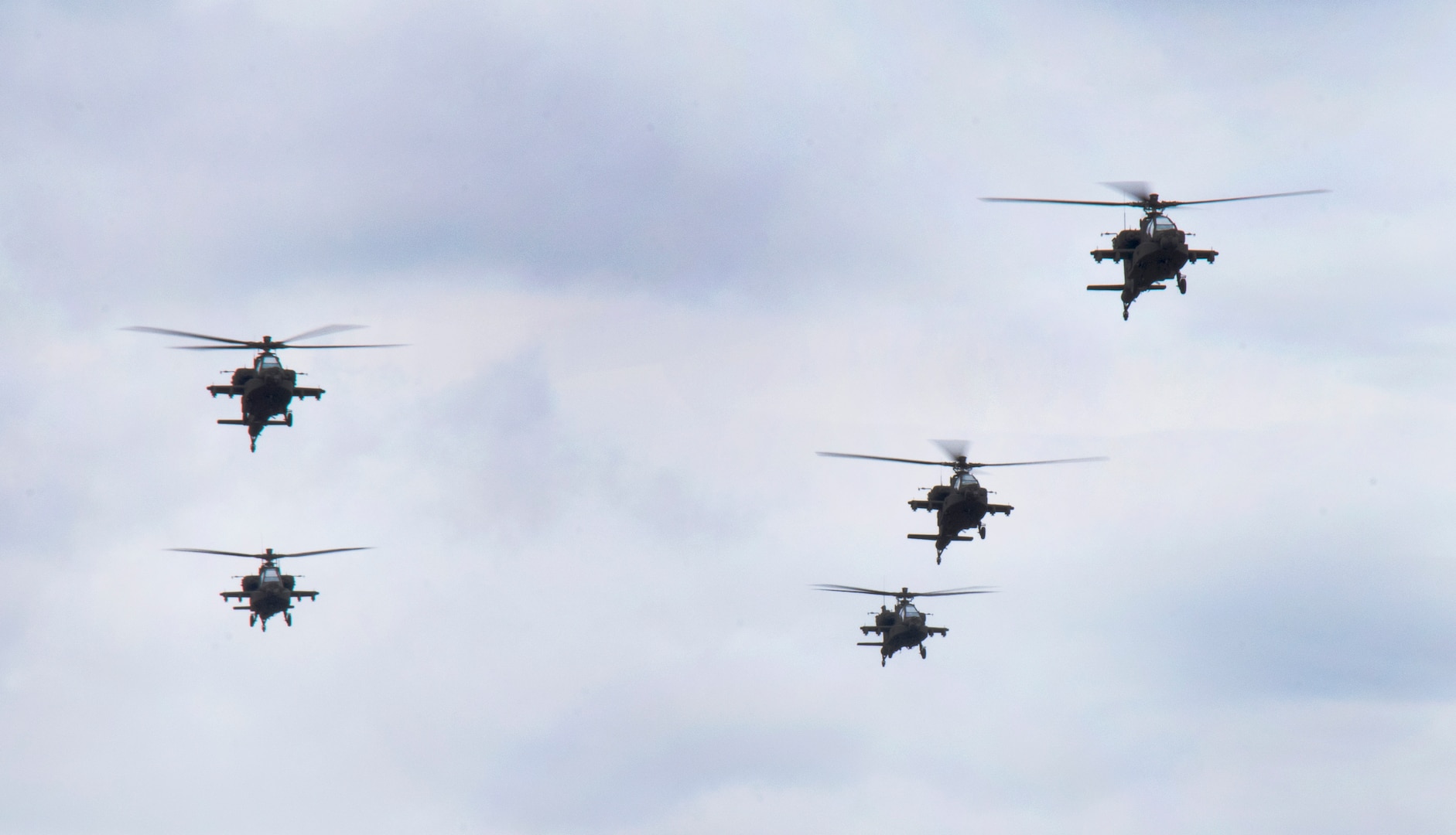 The first five AH-64E model Apache attack helicopters to be delivered to the South Carolina National Guard arrive at McEntire Joint National Guard Base, South Carolina, March 24, 2022. The South Carolina National Guard is replacing 24 D-model aircraft with the new E-model, which will be delivered to and flown by the 1-151st Attack Reconnaissance Battalion.