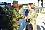 The commander of U.S. Southern Command, U.S. Army Gen. Laura Richardson, greets Colombian Gen. Luis Navarro, Colombia’s Chief of Defense, upon his arrival to SOUTHCOM headquarters.